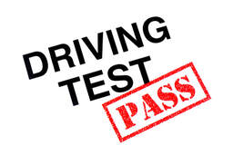 Picture of a Driving Test heading stamped with a red Pass